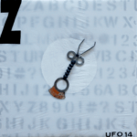 The Buzz, metalen deeltjes op acryl op transparante afvalzak op papier en houten constructie The Buzz verbal 46- Ufo 14 -2019